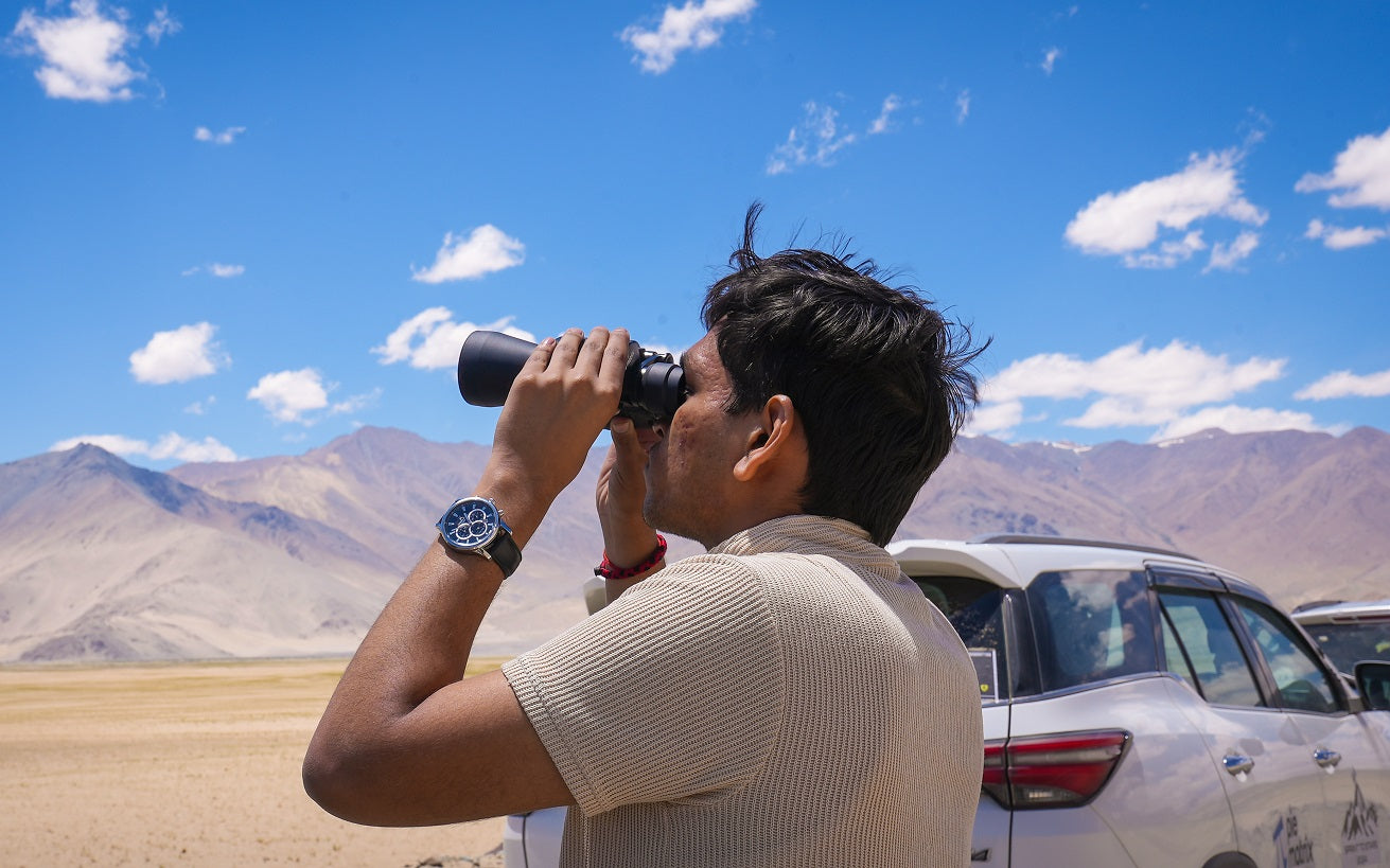 Men with binoculars