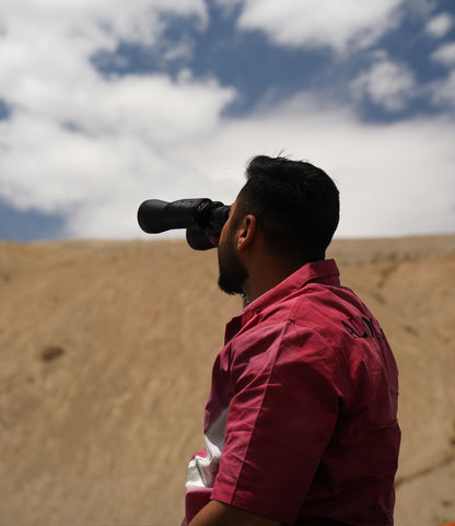 Men with binoculars